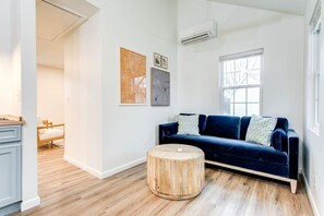The living room sitting area as you walk into the property.