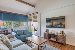 Sitting area adorned with a 65-inch smart TV