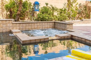 Soak your stress away in the built-in jacuzzi