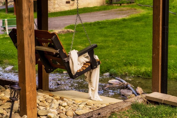 Swing overlooking the creek