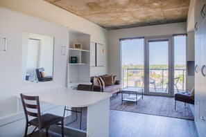 Murphy bed that folds up into a dining table/workspace
