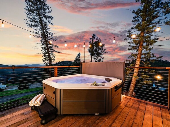 Unwind in the jacuzzi with a sunset view