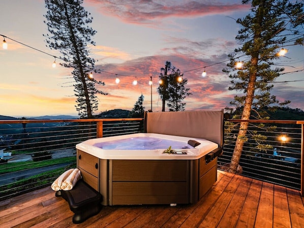 Unwind in the jacuzzi with a sunset view