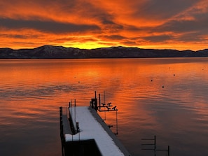 Enjoy the sunsets from the private dock, where the sky lights up in shades of gold and pink over the lake.