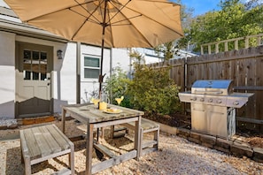 Backyard Patio with Seating and Grill