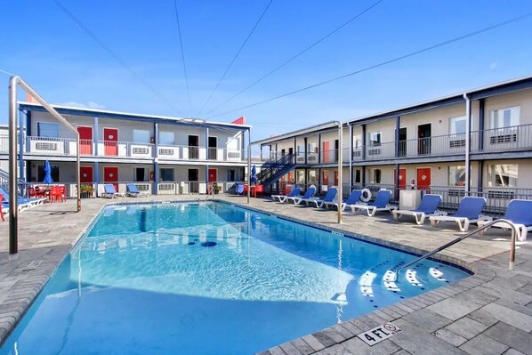 Step out the door to a beautiful Olympic Size Pool & lounge chairs to relax in.