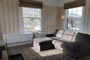 Revel in the tranquility of this spacious haven, where contemporary design meets comfort beneath a cascade of natural light.