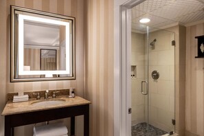 Refresh yourself in a modern bathroom designed with elegance and equipped with the finest amenities.