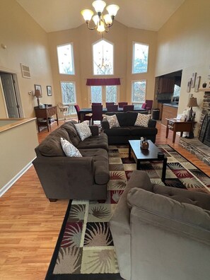 second view of living room, looking into dining room 