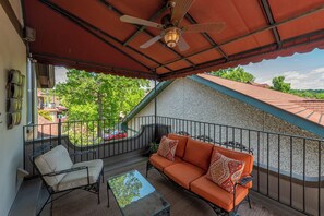 Enjoy coffee in the morning or a glass of wine in the evening on the balcony overlooking Biltmore Village.