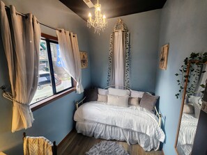 Twin size daybed with trundle that easily converts to a Queen size bed.