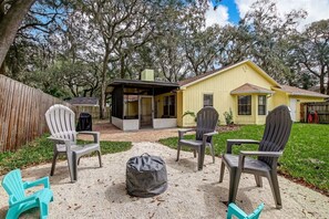 Gather Around the Firepit in the Fenced Back Yard