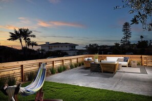 Spend time in the fenced off front yard space with great ocean breezes 
