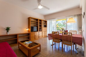 Bright living-dining area with terrace access