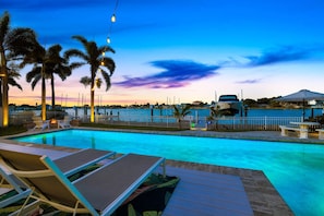 A dip in the pool at sunset can be one of the most enjoyable memories while visiting Magnolia By The Sea.