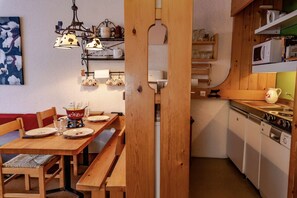 The kitchen is fully equipped with everything you need for cooking.