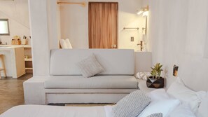 Sink into the spacious master bedroom at @casa.leah, where a king-size bed with premium linens invites you to rest deeply. Your private bathroom with a refreshing shower, along with air conditioning and ceiling vents, ensures every moment is pure com