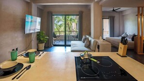 Kitchen and Living Room With TV and  vents