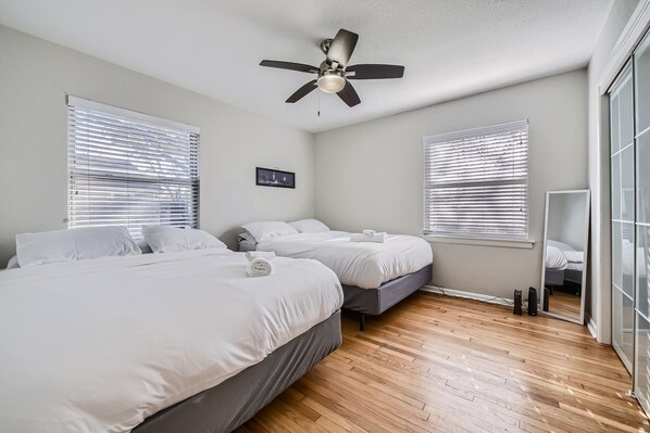 Guest bedroom with double queen beds