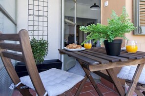 TERRACE - with seating to enjoy coffee on the balcony. 