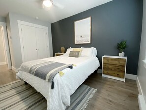 One of two bedrooms- featuring a queen bed. 