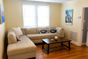 Living area with large couch to lounge out on