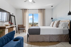 Dream easy in our studio's serene bedroom space.