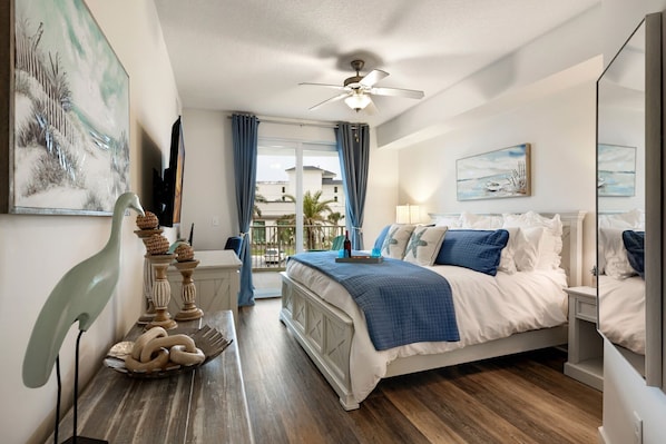 Master bedroom with king bed and attached master bathroom
