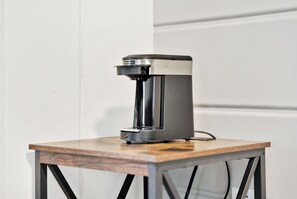 Start your day right with a hot cup o' Joe. Coffee supplies are provided.