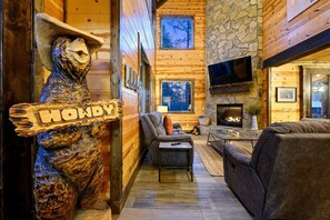 As you enter you're greeted by Howdy Bear and immediately catch a glimpse of that beautiful stone fireplace.