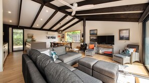 living area with high ceilings