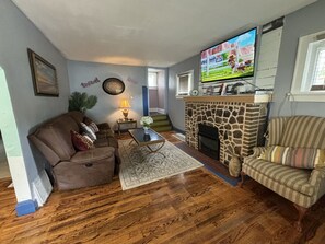 Enjoy the fireplace or catch a show on the big flat-screen TV.