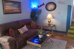 Settle in to the comfortable furnishings in the living room.