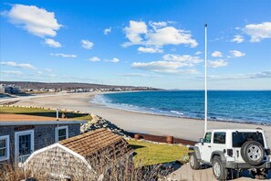 Directly across the street from beach access (at the flag pole)