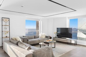 Living Room: Stunning views and stylish comfort await in this sunlit retreat!