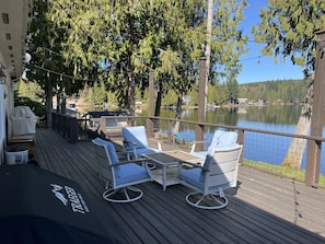 Deck off house close to kitchen, can sit and relax here all day. 