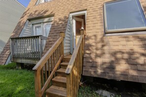 The stairs leading out to the back of the property.