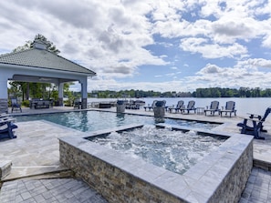 Lakeside pool, hot tub and BBQ with outdoor dining
