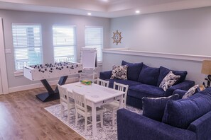 Upstairs family room includes sleeper sofa