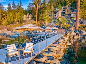 Our breakwater pier provides a sandy bottom swim lagoon with turquoise water
