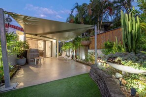 Private flat entry to a serene garden courtyard, blending with chic indoor style