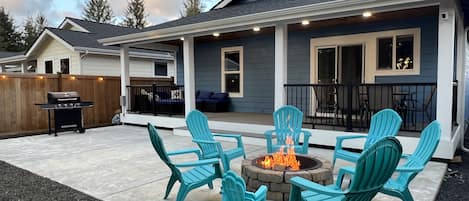 Back yard patio with fire-pit. Guests will need to provide their own firewood.