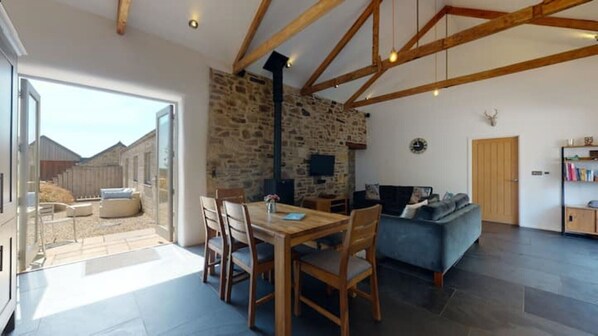 Open plan living - french doors to courtyard patio