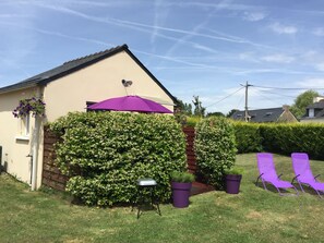 Exterieure maisonnette avec transats