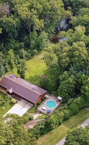 1.5 acres of tree lined space. Galien River borders end of property