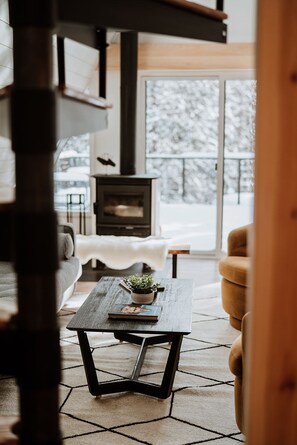 Cozy and inviting living space & wood burning fireplace