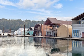 View from across the bay. 2 story brown roof