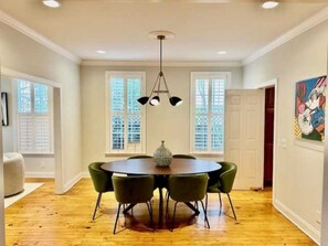 Dining area adjoins both the sitting area and the kitchen.