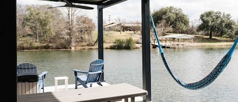 No lake house is complete without a hammock. So nice to lie here in the shade of the covered deck and sway to the soft breeze coming off the lake.