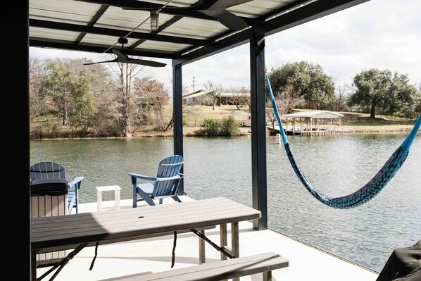 No lake house is complete without a hammock.  So nice to lie here in the shade of the covered deck and sway to the soft breeze coming off the lake.